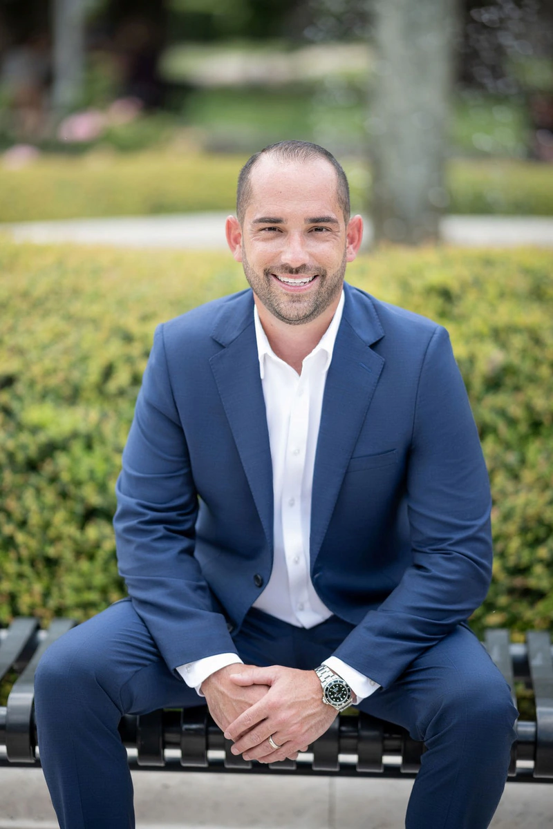 Justin McCarthy, Winter Park Realtor, near the fountain in Central Park